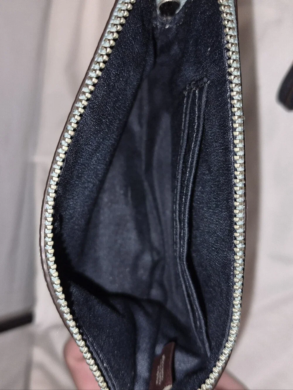 Coach corner zip